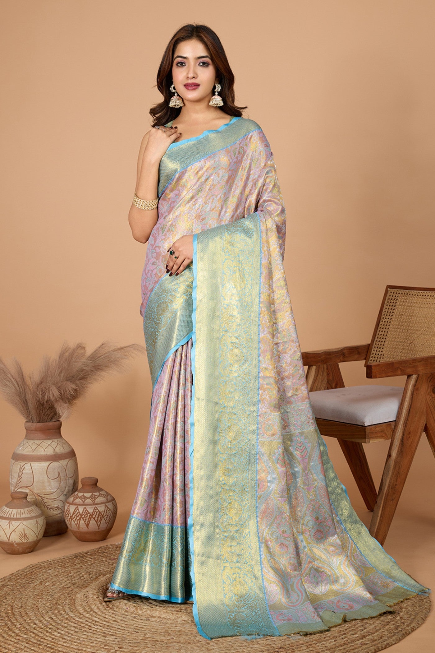 Brighten Pink woven Kanjivaram saree with contrast zari border and temple motifs