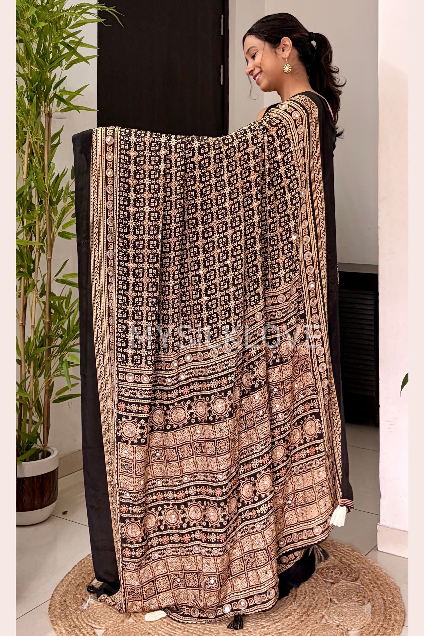Buy MySilkLove Metal Black Modal Ajrakh Satin Printed Mirror Work Saree Online