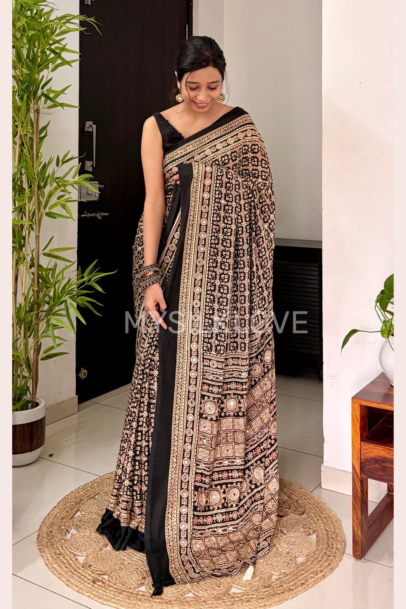 Buy MySilkLove Metal Black Modal Ajrakh Satin Printed Mirror Work Saree Online