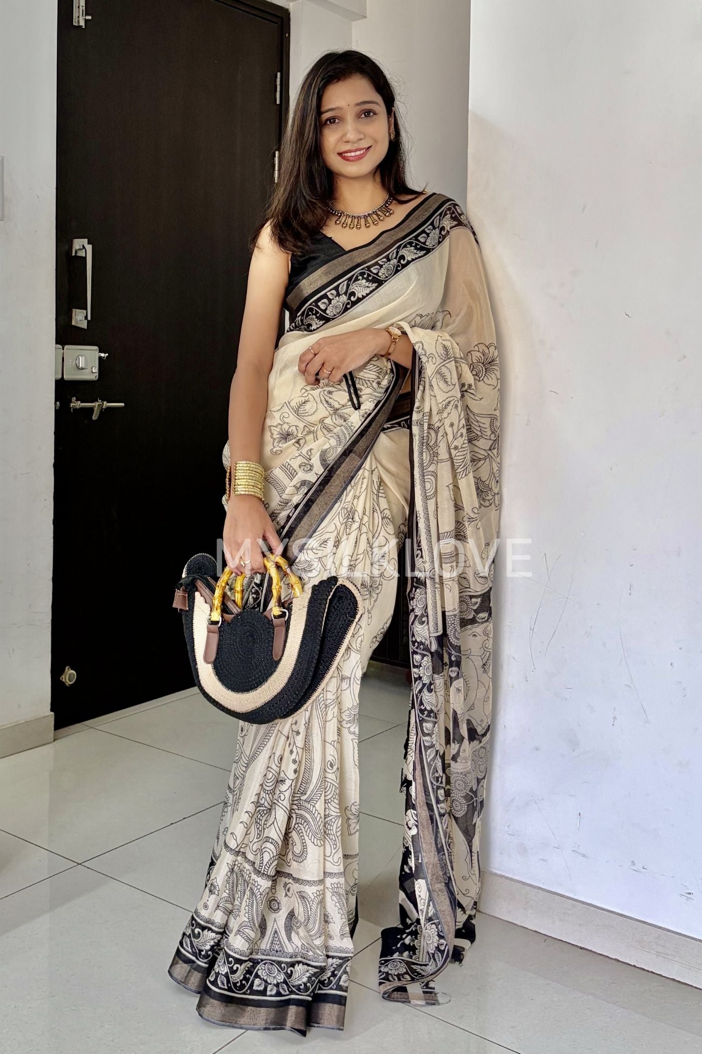 MySilkLove Rashmika Mandanna Inspired- Black and Cream Mul Cotton Kalamkari Saree