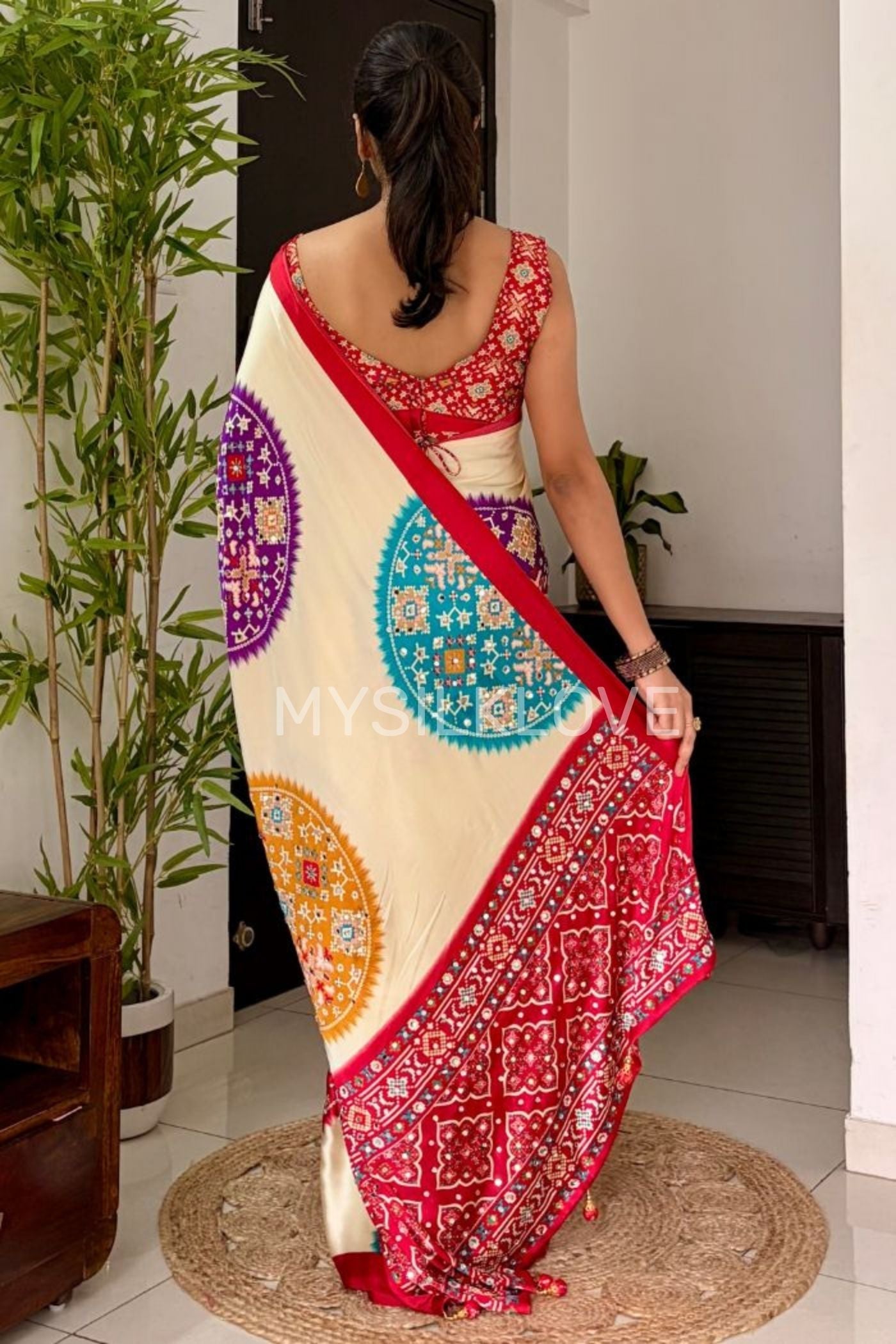 Buy MySilkLove Cookie Cream and Red Modal Ajrakh Satin Printed Mirror Work Saree Without Blouse Online