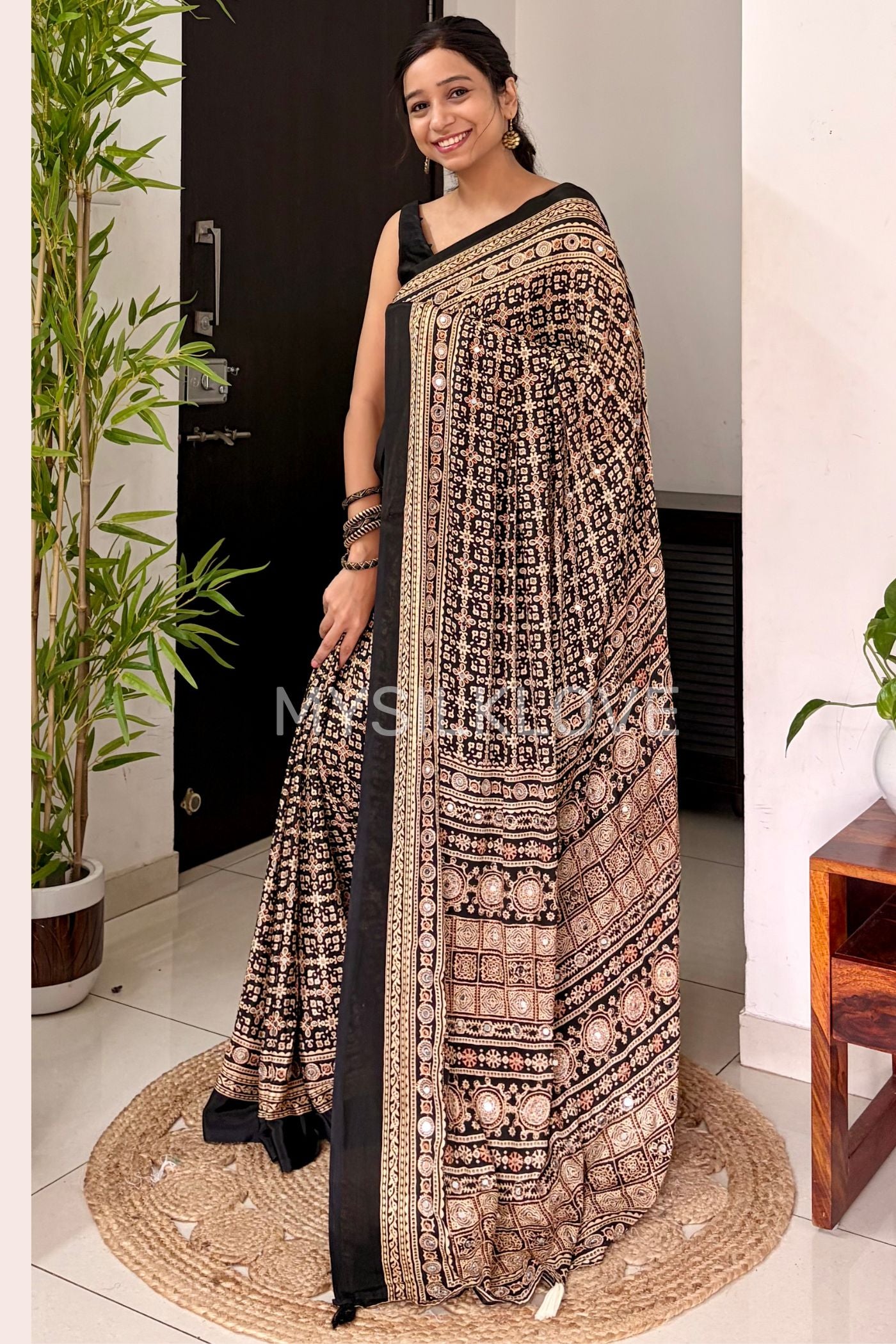 Buy MySilkLove Metal Black Modal Ajrakh Satin Printed Mirror Work Saree Online