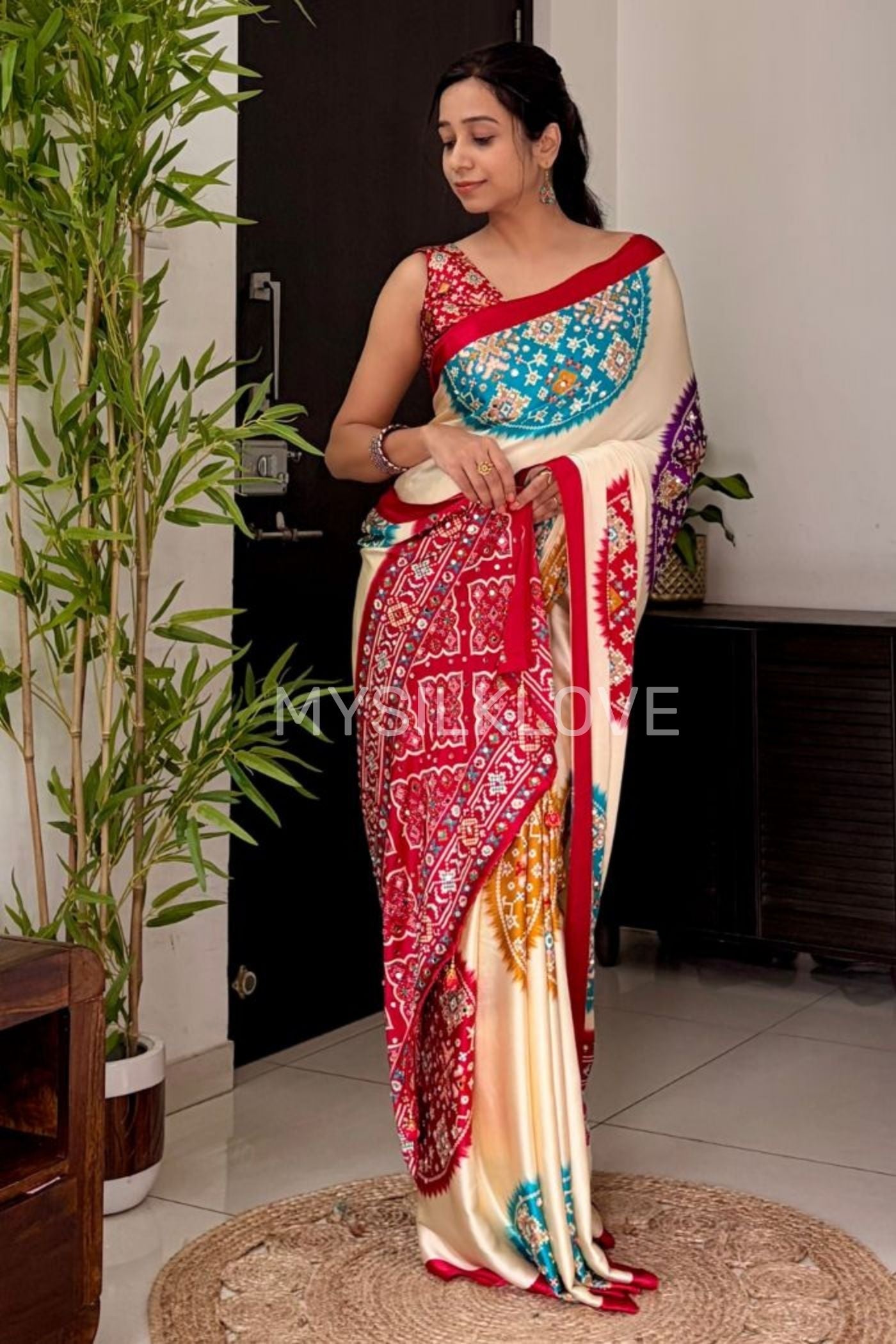 Buy MySilkLove Cookie Cream and Red Modal Ajrakh Satin Printed Mirror Work Saree Without Blouse Online