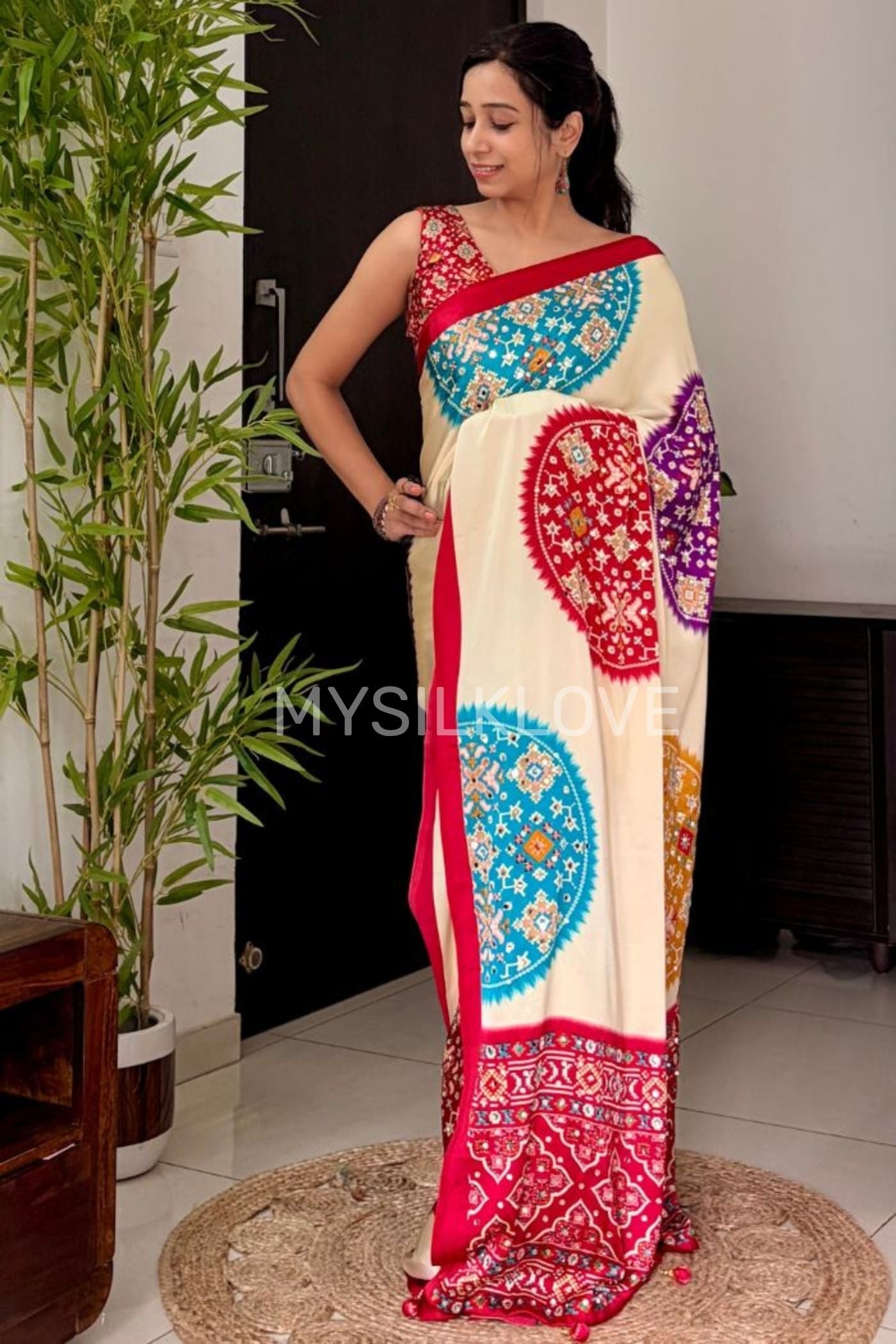 Buy MySilkLove Cookie Cream and Red Modal Ajrakh Satin Printed Mirror Work Saree Without Blouse Online