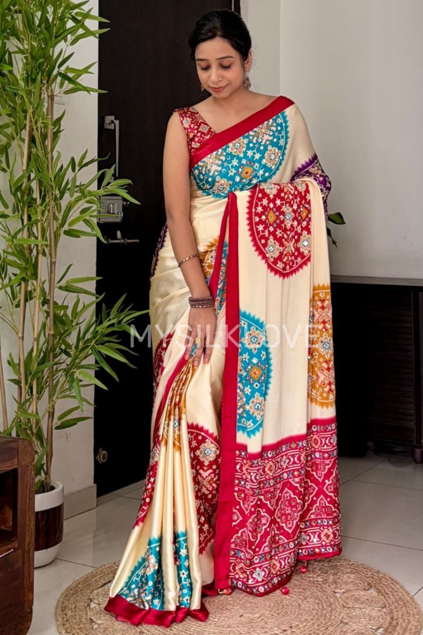 Buy MySilkLove Cookie Cream and Red Modal Ajrakh Satin Printed Mirror Work Saree Without Blouse Online