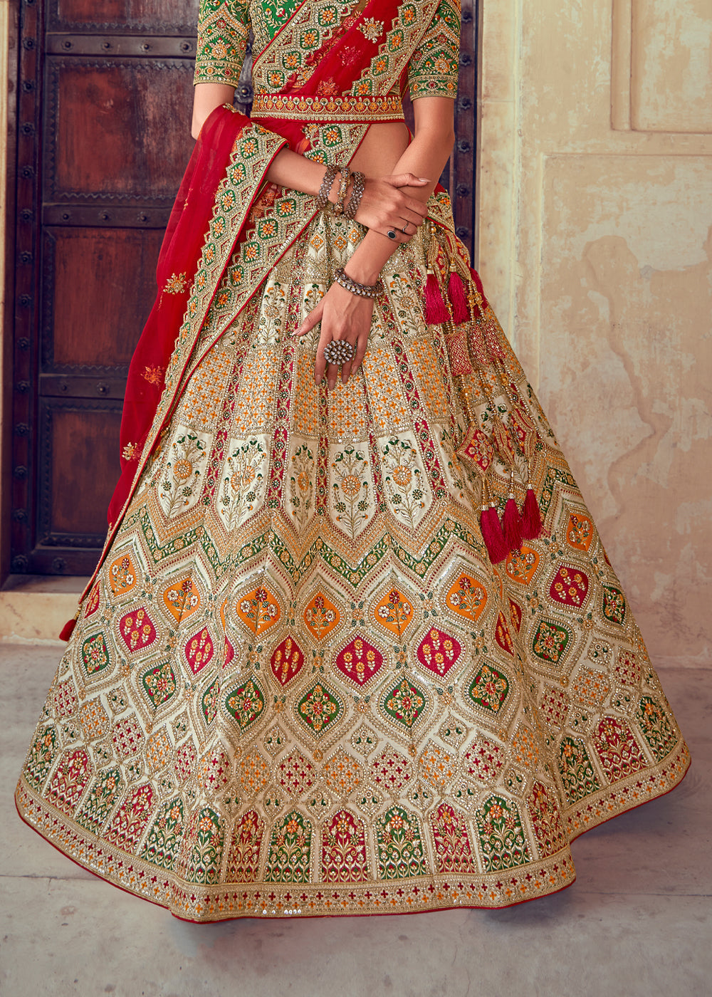 Cognac Red and Green Heavy Embroidered Designer Lehenga