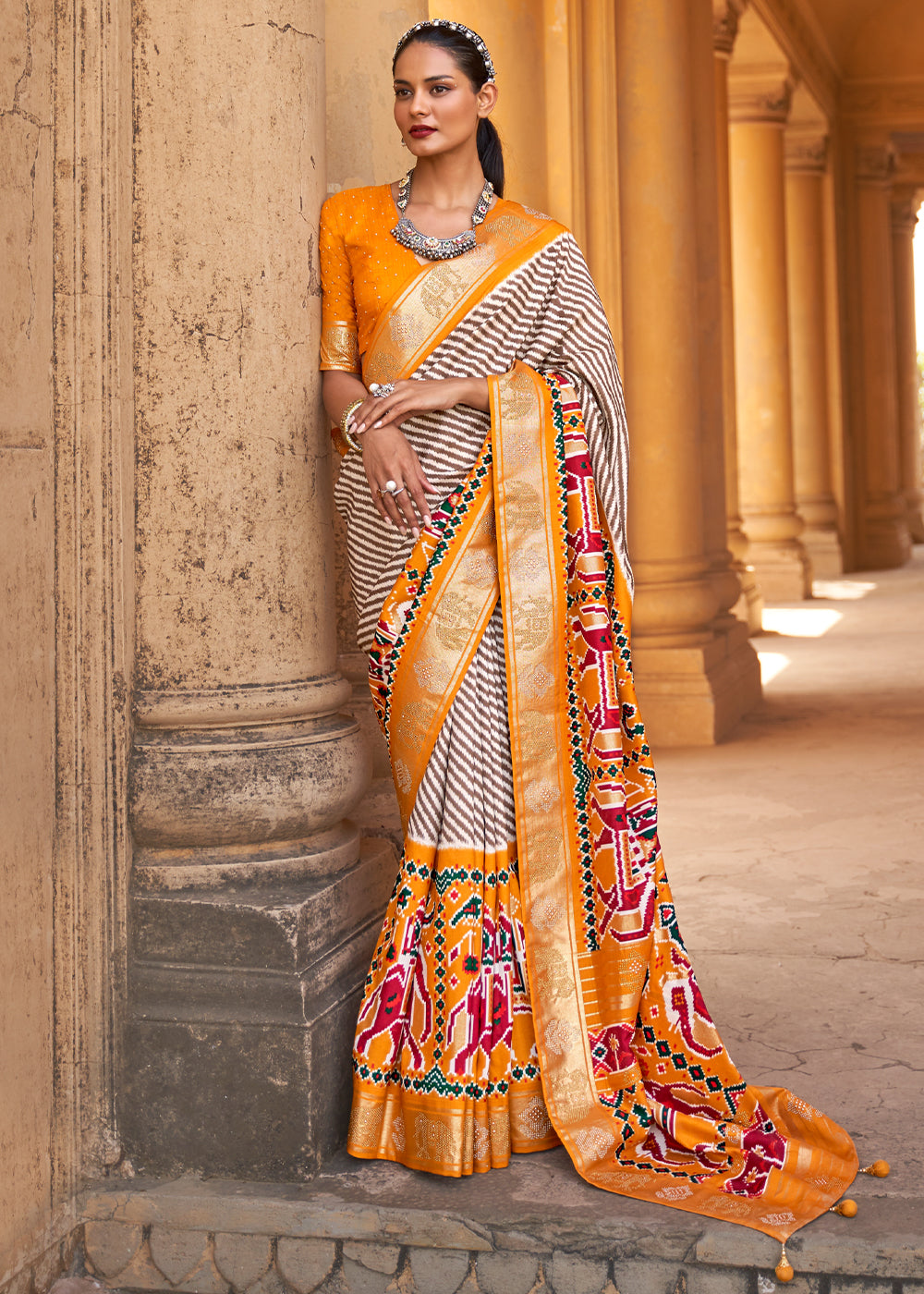 Buy MySilkLove Tango White and Orange Zari Woven Patola Saree Online