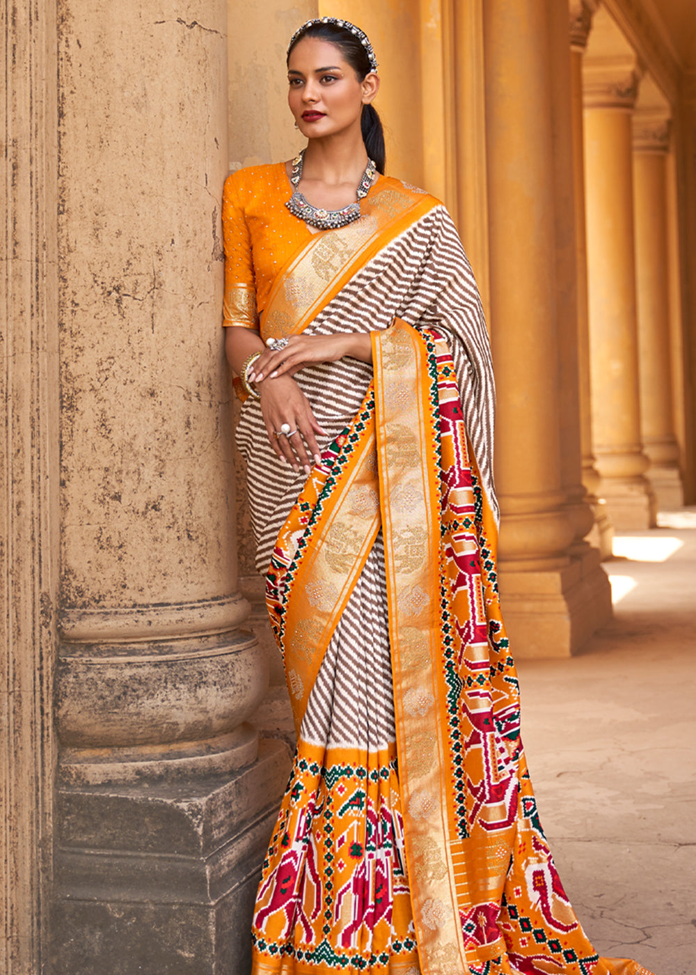 Buy MySilkLove Tango White and Orange Zari Woven Patola Saree Online