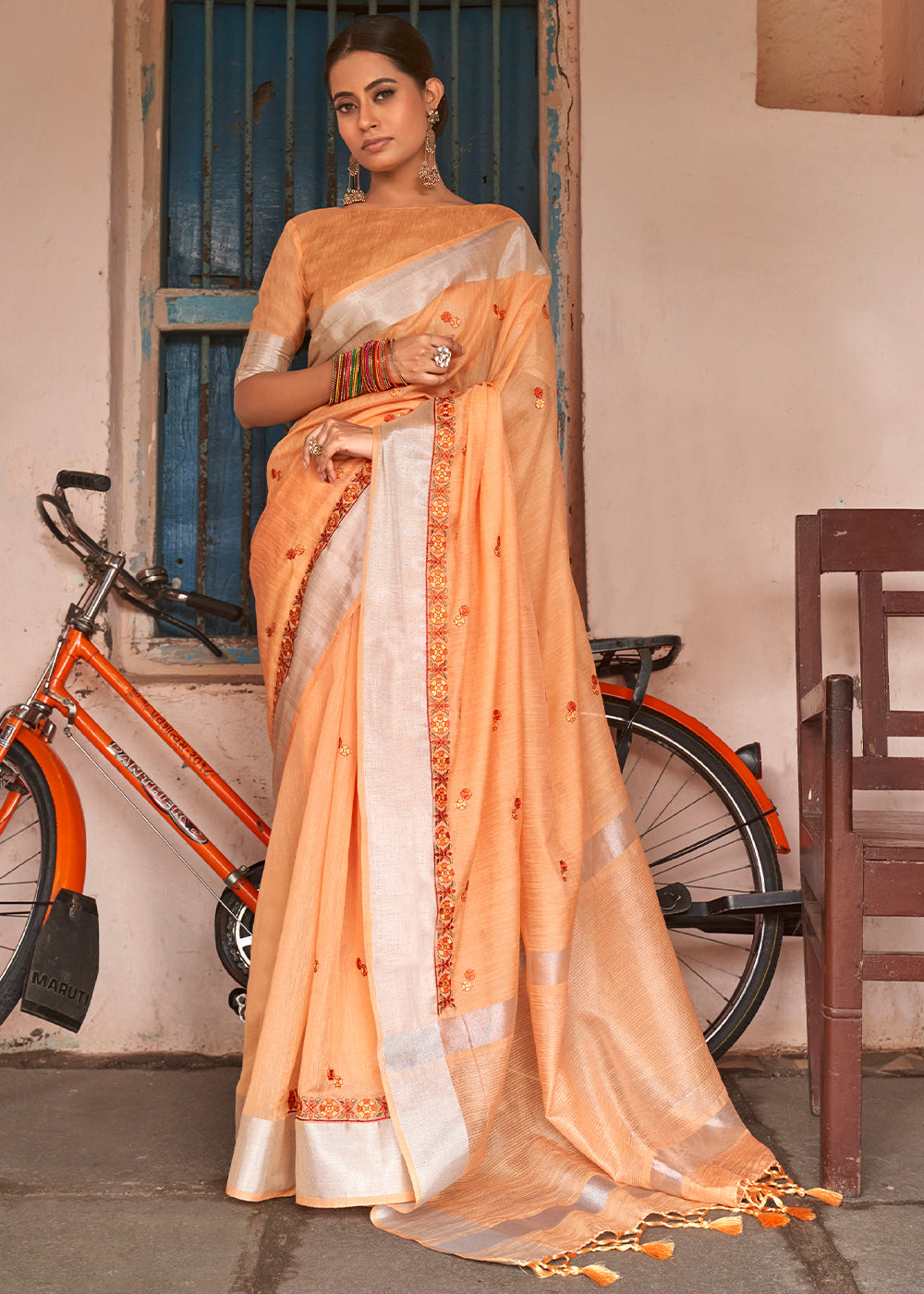 Buy MySilkLove Flesh Orange Floral Embroidered Linen Saree Online