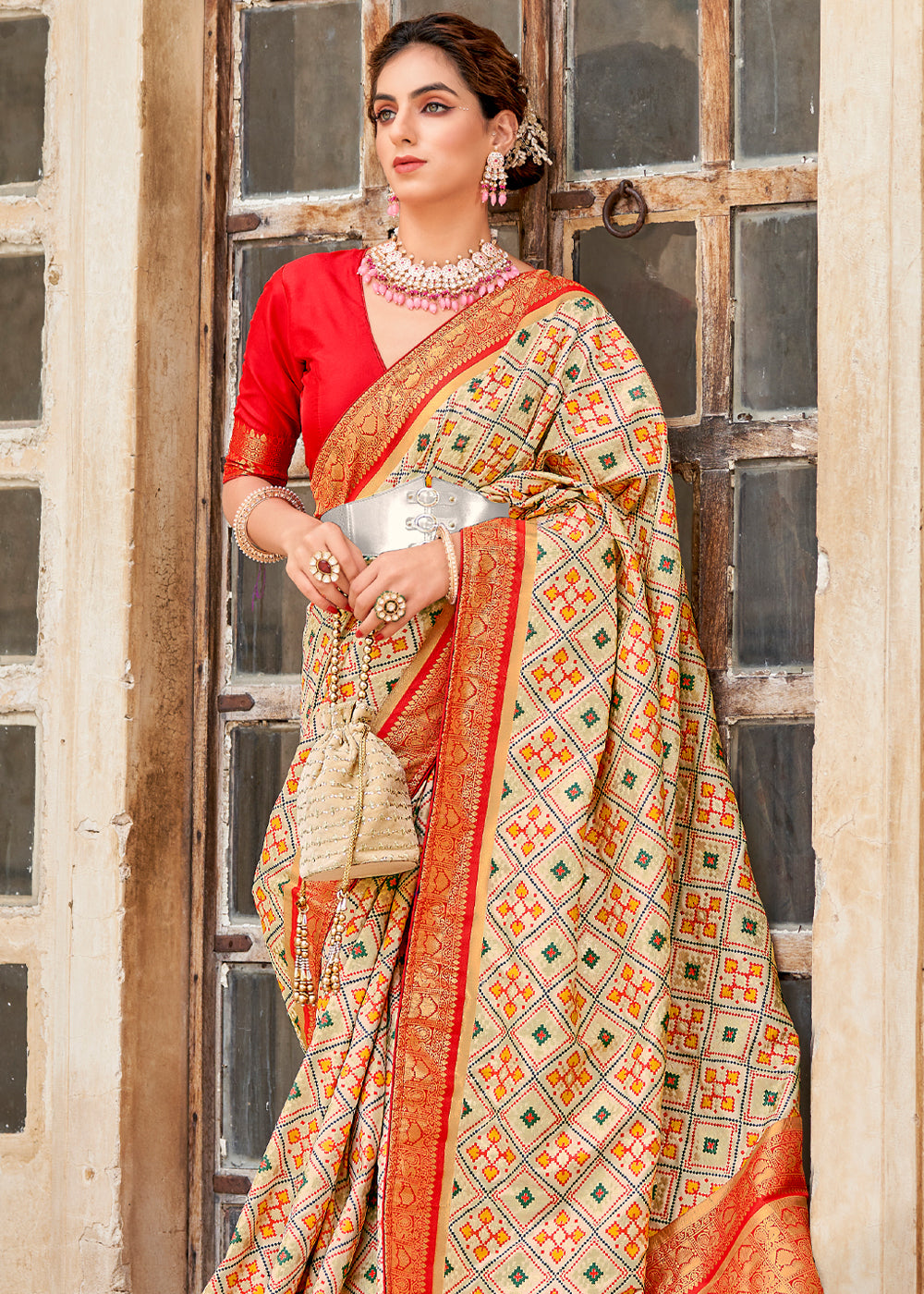 Buy MySilkLove Apricot Cream and Red Zari Woven Patola Saree Online