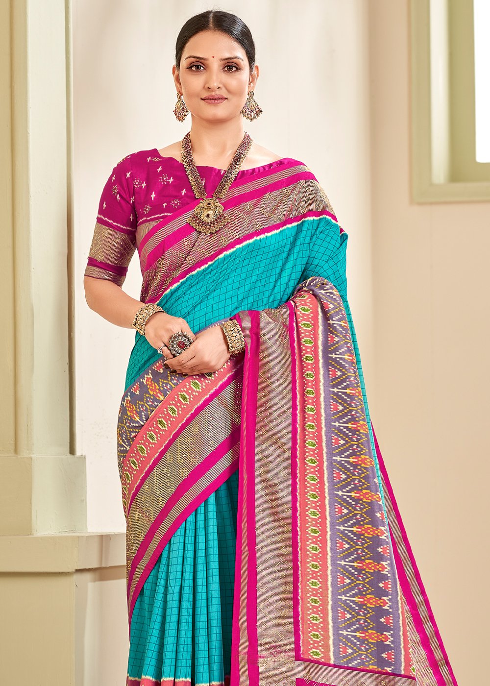 Buy MySilkLove Pelorous Blue and Pink Zari Woven Patola Silk Saree Online